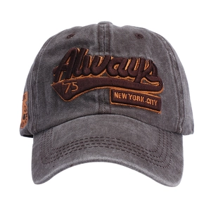 Close-up of Always letter embroidery and distressed fabric on a vintage baseball cap