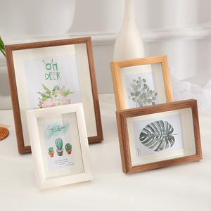 Set of four minimalist solid wood picture frames in oak, dark wood, and white finish