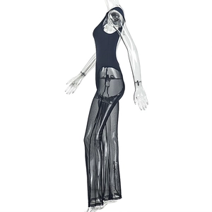 Side view detail of black mesh patchwork wide-leg jumpsuit with high waist design