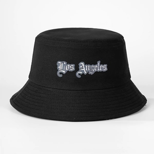 Classic black cotton bucket hat with white Los Angeles embroidery on a plain background