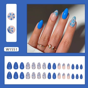 Short almond press-on nails set with navy blue solid color and floral patterns