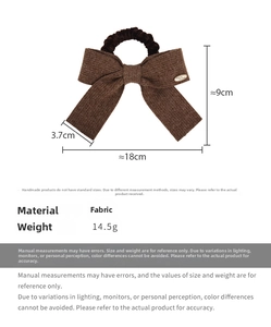 Detailed view of brown knit bow hair tie with dimensions 18cm x 9cm on white background
