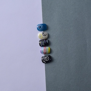 5D embossed 5-piece nail sticker set with cute smiley faces and hearts in Korean style