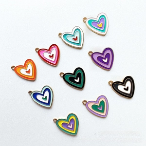 Detailed view of colorful heart enamel alloy charms for DIY necklaces and bracelets