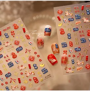 Detail of 3D embossed Chinese New Year nail art stickers with gold foil lucky charms