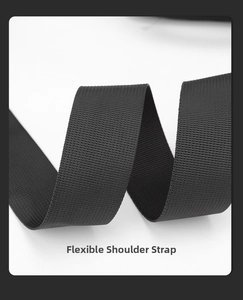 Macro shot of flexible black nylon shoulder strap with durable twill weave texture