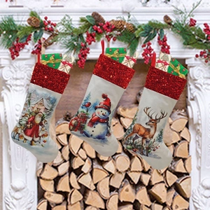 Christmas stockings set with Santa, Snowman and Reindeer patterns hanging by the fireplace