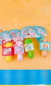 Detailed view of colorful mini microphone keychains with food-themed charms and lanyards