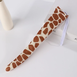 Detail of giraffe tail costume accessory with brown spots and elastic attachment