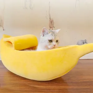 Banana shaped warm plush pet bed in bright yellow for cats and small dogs