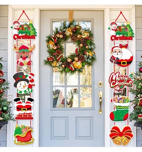 Outdoor view of Merry Christmas door banners with Santa, snowman and reindeer ornaments