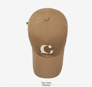 Detailed top view of a khaki cotton twill baseball cap with white letter C embroidery