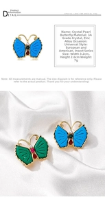 Detail of rhinestone pearl butterfly brooch with 3.2cm width and 2.6cm height dimensions