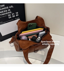 Interior view showing the large storage capacity of this brown leather tote bag