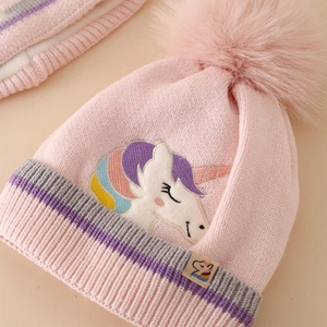 Pink unicorn knit hat for girls with pompom and warm fleece lining for winter weather