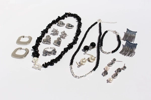 Detailed collection of minimalist black onyx bead earrings and silver pearl jewelry sets