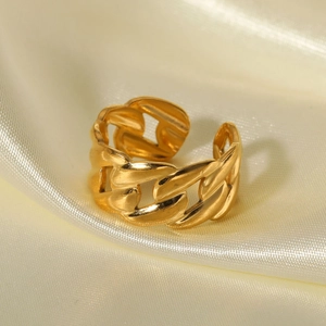 Minimalist 18K gold plated stainless steel chain ring on cream silk background
