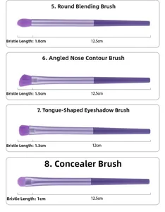 Détail de quatre pinceaux de maquillage violets avec fibres douces et manches mats