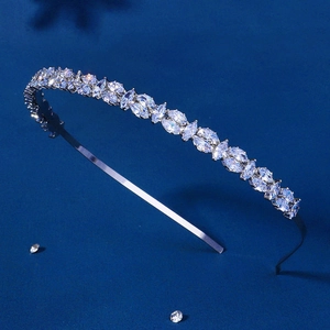 Close-up of sparkling marquise and round cut crystals on a slim silver headband