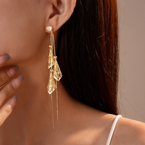 Elegant 18K gold plated long tassel earrings with hollow cone pendants and zircons