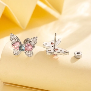 Titanium butterfly stud earrings with pink heart crystals and blue gems in silver finish