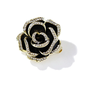 Elegante spilla a camelia nera con petali dorati e strass in cristallo scintillante