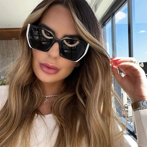Fashionable oversized cat-eye sunglasses with monochrome geometric frame for women