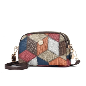 Fashionable color-block shell bag with multi-color patchwork and golden hardware details