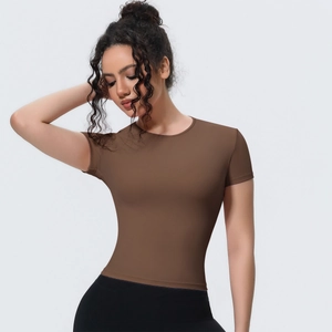 Close-up of brown slim-fit sports T-shirt featuring high-stretch quick-dry breathable fabric