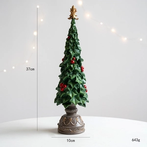Detail of vintage Christmas tree decoration with golden star and red berry accents