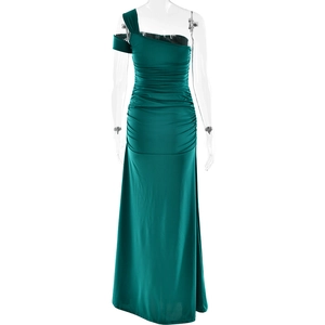Detail view of green one-shoulder pleated dress with slim fit and side slit design