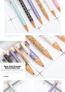 Detail showing retractable glitter pens with rose gold accents and fish scale textures