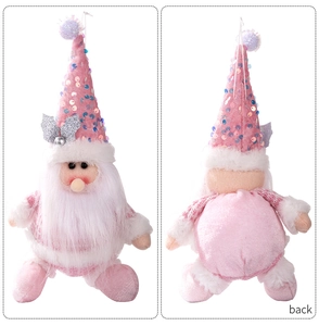 Front and back detail of a pink sequin Christmas gnome plush ornament on white background