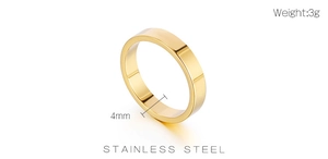 Macro detail showing 4mm width and 3g weight of the golden stainless steel ring