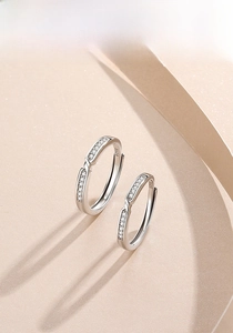 Close-up of S925 sterling silver hoop earrings with shimmering pavé set cubic zirconia