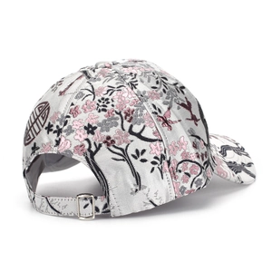 Silver baseball cap with cherry blossom embroidery and vintage badge seen from behind