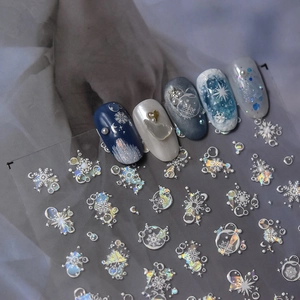 Macro view of holographic snowflake nail stickers with iridescent winter patterns