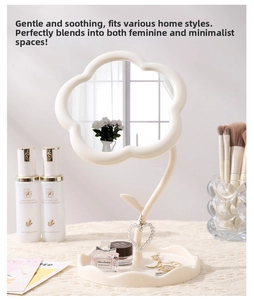 Sunflower-shaped vanity mirror with a cream white wavy storage tray on a vanity table