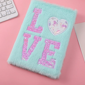 Cute mint green plush cat notebook with shiny purple LOVE sequins on pink background