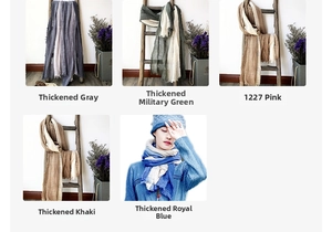 Detailed view of linen-cotton scarves with frayed fringe in various gradient colors