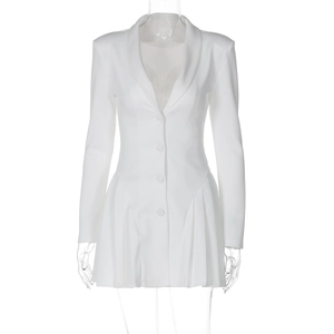 Detail of white deep V-neck blazer dress showing ruffled hem and long sleeves