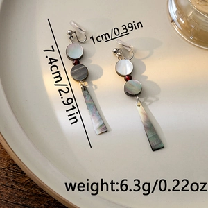 Macro detail of Chinese style beaded tassel earrings with size and weight measurements