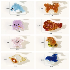 Colorful marine animal hair clips set featuring octopus and dolphin with size details