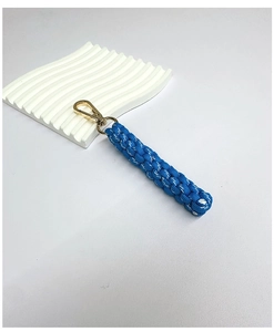 Close-up of blue handmade braided keychain with a durable gold metal lobster clasp