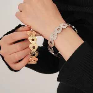 Retro wide hollow heart chain bracelets in gold and silver with hammered metal texture