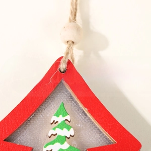 Close-up of wooden Christmas tree ornament with jute rope and natural wood bead