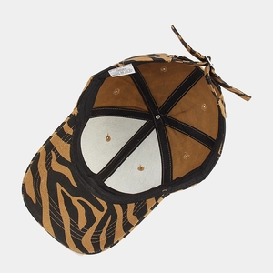 Detail of the 100% cotton baseball cap showing internal stitching and adjustable strap