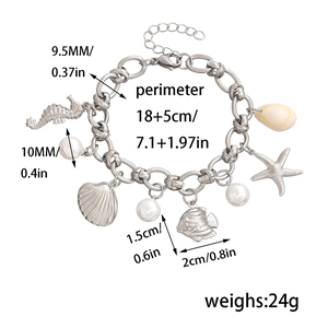 Détails du bracelet océan argenté avec dimensions des breloques étoile de mer et coquillage