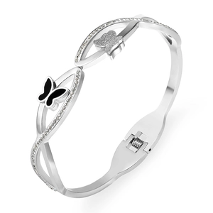 Silver butterfly hinge bangle with black enamel detailing and sparkling rhinestones
