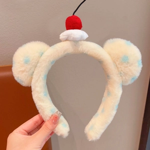 Plush Mickey ear headband with light blue polka dots and a red cherry accent